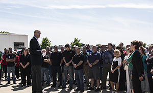 Tom Pientok speaks during Apache's groundbreaking ceremony